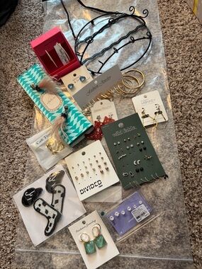 72 pierced earring lot with hanging display